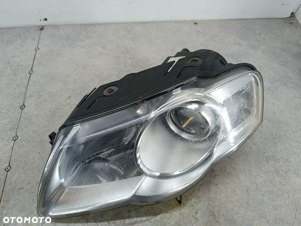 LAMPA PRZÓD LEWA VW PASSAT B6 3C0941005Q 1EL247014-11  HELLA - 3