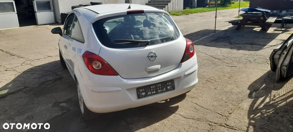 ZDERZAK tylny OPEL CORSA D - 1