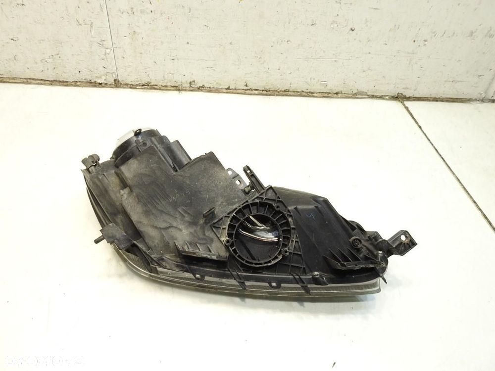 LAMPA LEWY PRZÓD XENON MAZDA CX-7 EH1051040 10041028 - 4