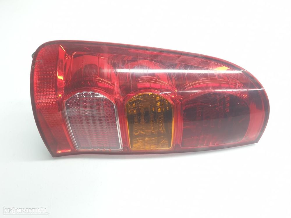 FAROLIM TRASEIRO ESQUERDO TOYOTA HILUX KUN - 1