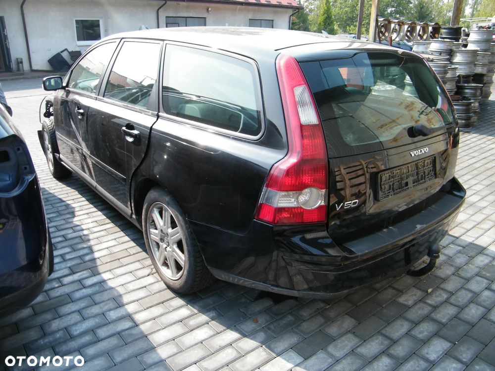 Volvo V50 (04-07r.) 2.0 TD 136KM. Silnik D4204T Skrzynia MMT6 lakier 019 – Black Stone. Cały na części. GWARANCJA !!!  Przód Tył Zestaw Komplet Drzwi Klapa Zderzak Błotnik Maska Grill Atrapa Szyba Pas Lampa Lusterko Boczki Fotel Kanapa Kokpit Deska Rozdzielcza Przełącznik Włącznik Sterownik Przewody Wiązka Instalacja Moduł Komputer Czujnik Listwa Pompa Alternator Wtryski Głowica Rozrusznik Kompresor Sprzęgło Dwumas Silnik Skrzynia ABS Klimatyzacji Paliwa Wspomagania Kolektor Turbina Przepustnica Zawór Chłodnica Koło Hak Belka Sanki Zawieszenie Mcpherson Półoś Amortyzator Wydech Tłumik Zacisk Most - 5