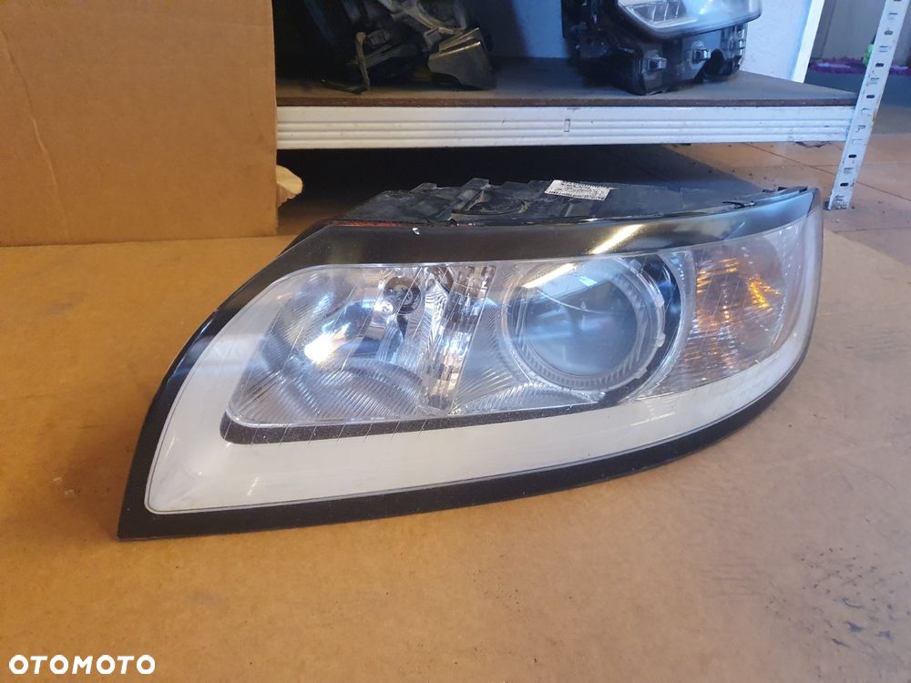 REFLEKTOR LEWY VOLVO S40 V50 LIFT SOCZEWKA EUROPA - 1