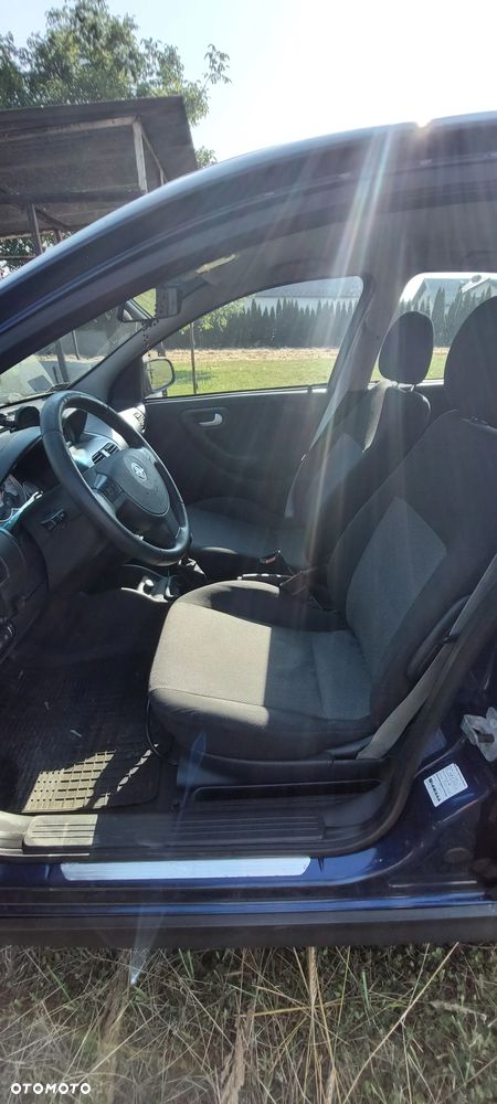 Opel Corsa 1.2 16V Enjoy - 8