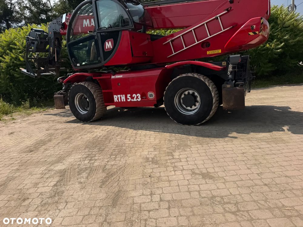 Magni RTH 5.23 SH-D/C Ładowarka teleskopowa Obrotowa roto 23 metry wysuw. 5 ton Udźwig. Wciagarka Hydrauliczna 5 ton. Pilot zdalnie sterowana. DEUTZ Silnik 145 KM. Jak Nowa Z Norwegii 2019 rok. 3200 mtg. Serwisy DEKRA TUV aktualne. Full Wypas. Klima stabilizatory 2 osie. Pilot. Maszyna z Norweskiej Upadłośći. Stan maszyny nie różni się od nowej z Salonu! Zero luzów na wszystkich siłownikach i podzespołach. ani deka wycieków. OKAZJA. Pełna Dokumentacja - 3