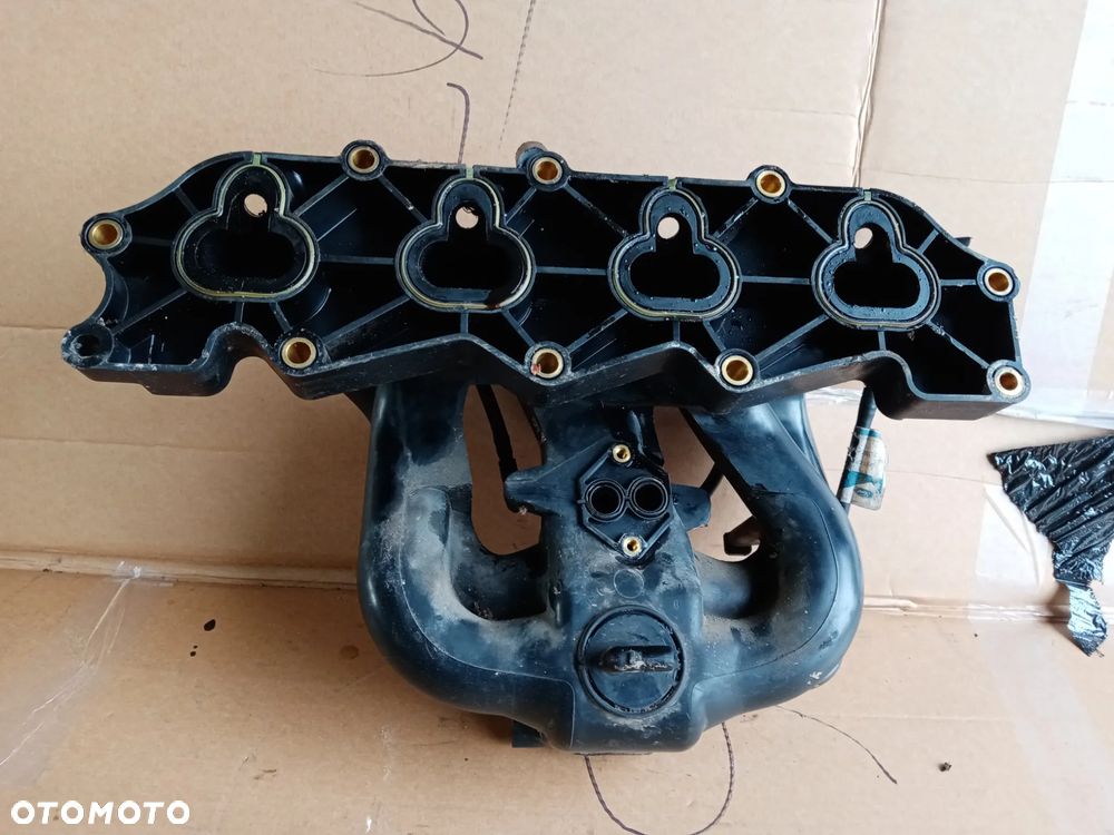 Kolektor ssący Ford Escort MK7 1.6 958-9424-CC - 2