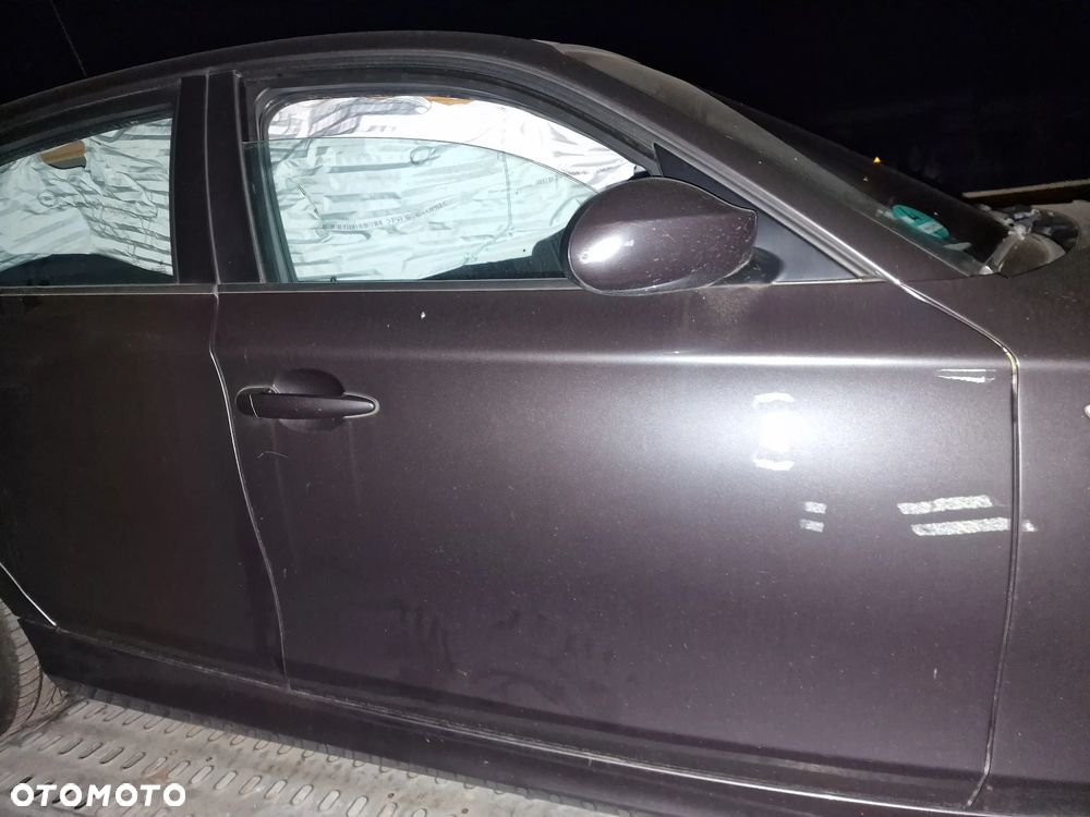 Drzwi  prawy przód BMW  e87  w kolorze  A22 - 1
