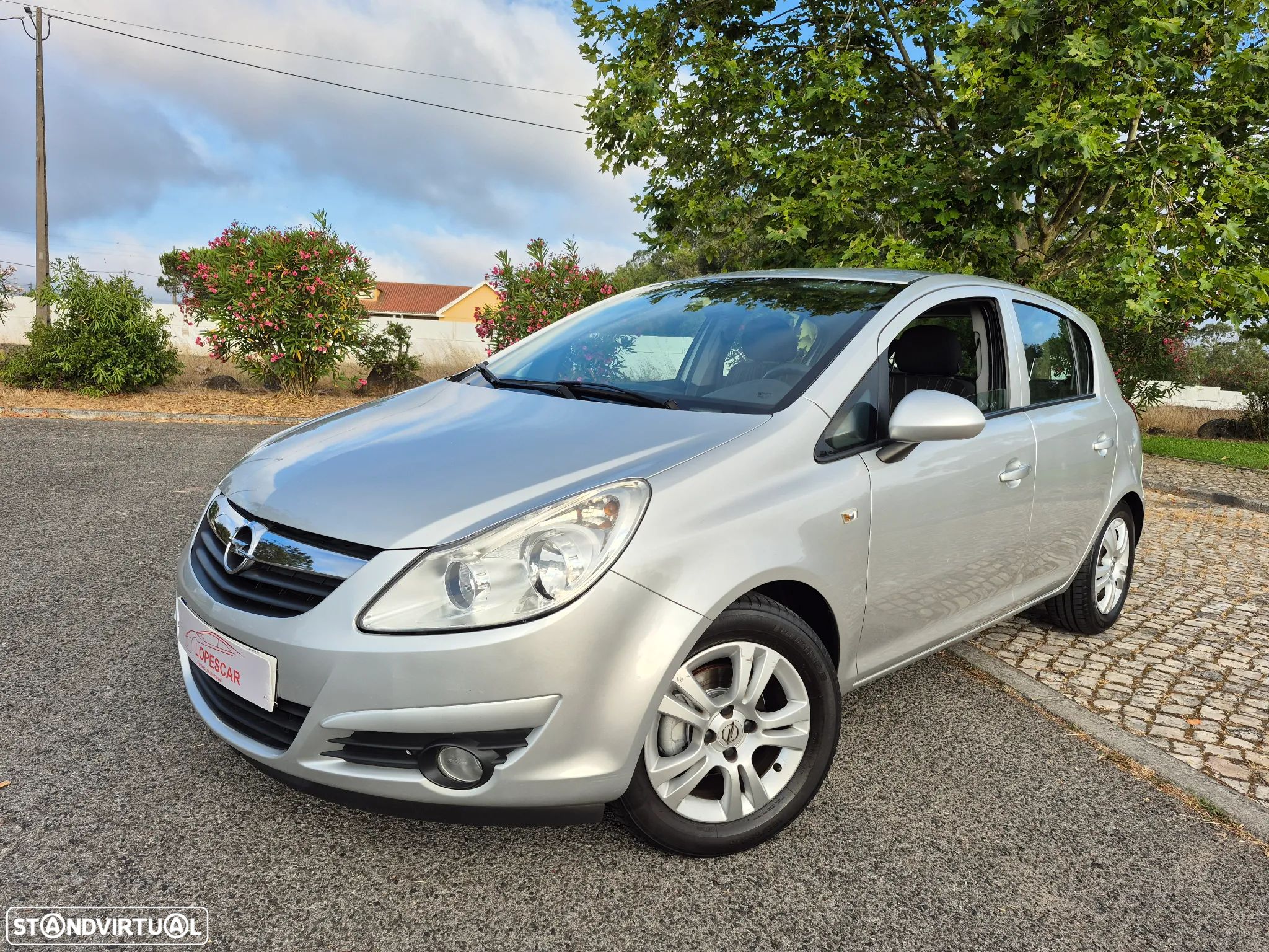 Opel Corsa 1.2 Enjoy - 1