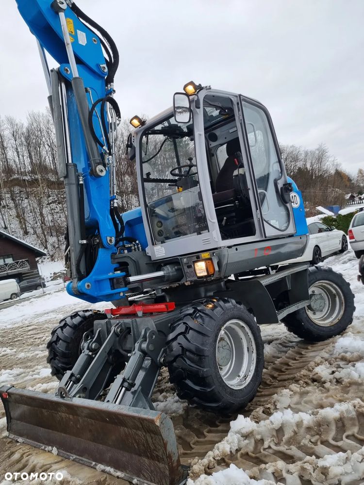 Wacker Neuson EW100 Koparka Kołowa 11 ton. 3x Ramię +ROTOTIL z regulacją szybkości+ Skosowanie Hydr+Pompa ON Łyżki. z Norwegii Jak Nowa z salonu! 2086mtg PERKINS silnik. STABILIZATORY Klima. DEKRA 2026r. Książka serwisowa. Szybkozłącze Hydr. Opcja podpięcia samego wiertła do gleby. - 4