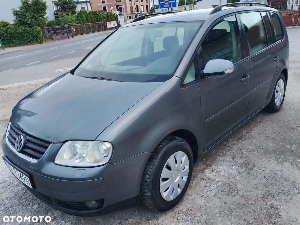 Volkswagen Touran 1.9 TDI DSG Highline - 1