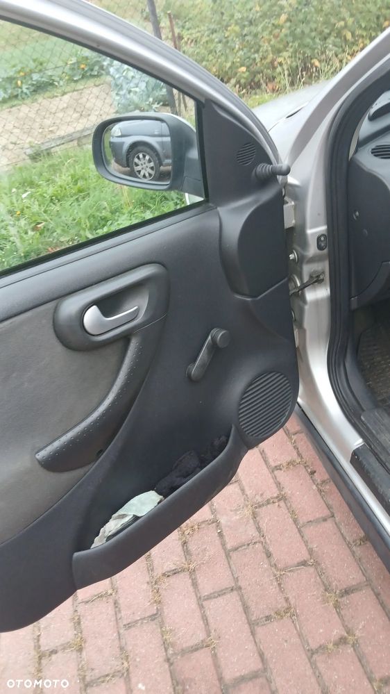 Opel Corsa 1.2 16V NJoy - 6
