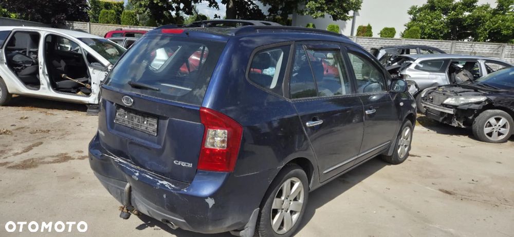 KIA CARENS III belka zawieszenie tył - 2