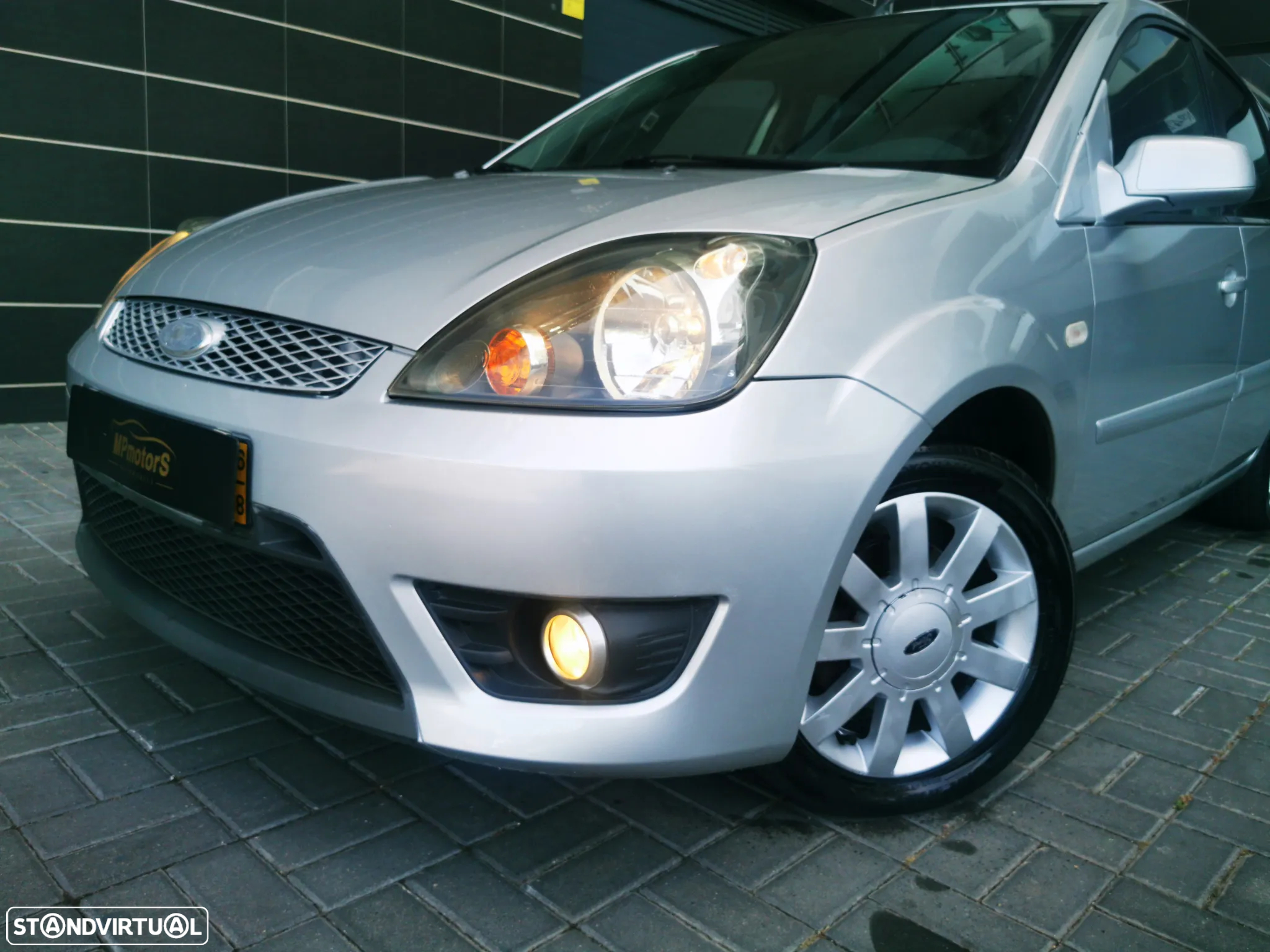Ford Fiesta 1.25 Ghia - 13
