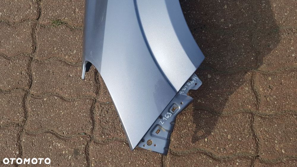 Błotnik przód  lewy  Opel Astra H III kod lakieru Z163 - 3