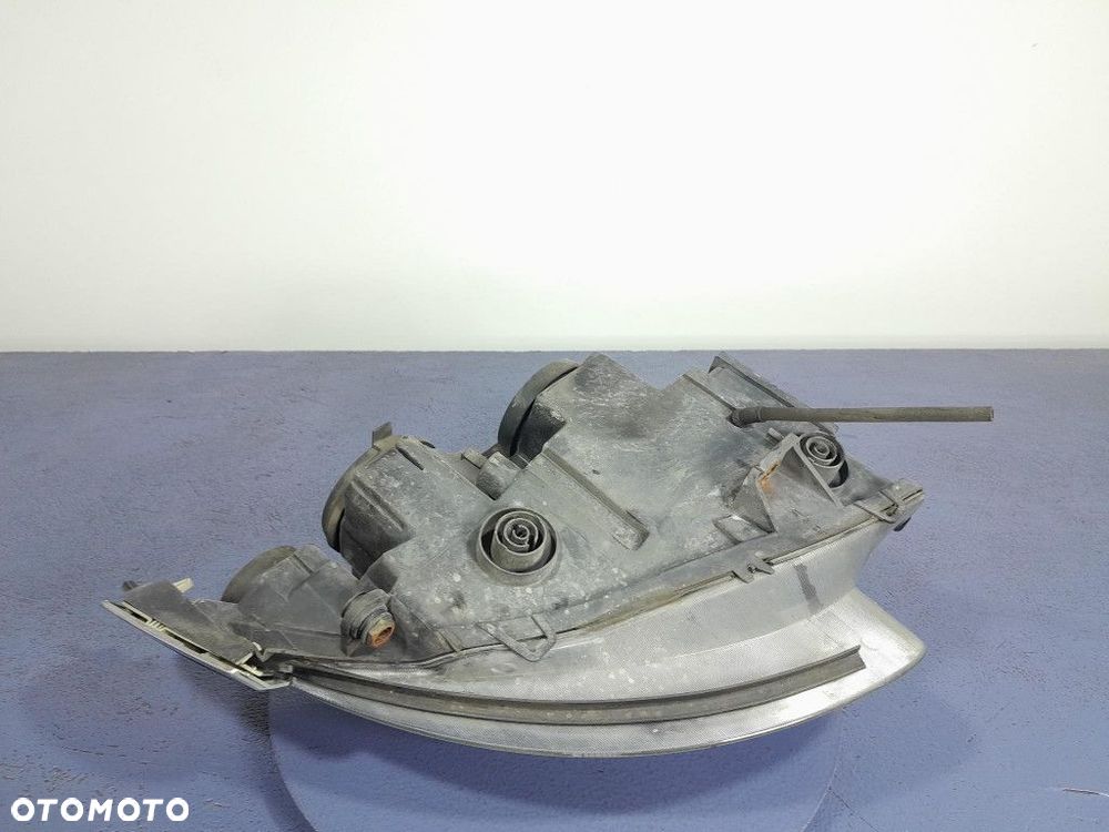 SAAB 9-5 I LIFT REFLEKTOR LAMPA LEWY EU - 9