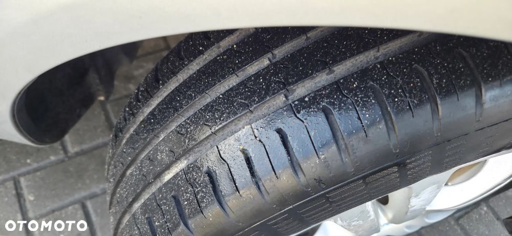 Opel Corsa 1.2 16V Enjoy - 21