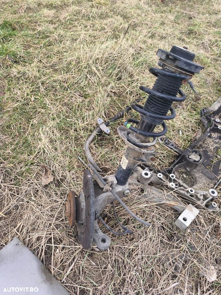 Set amortizoare față cu arcuri și flanșe Volkswagen Passat B6 - 2