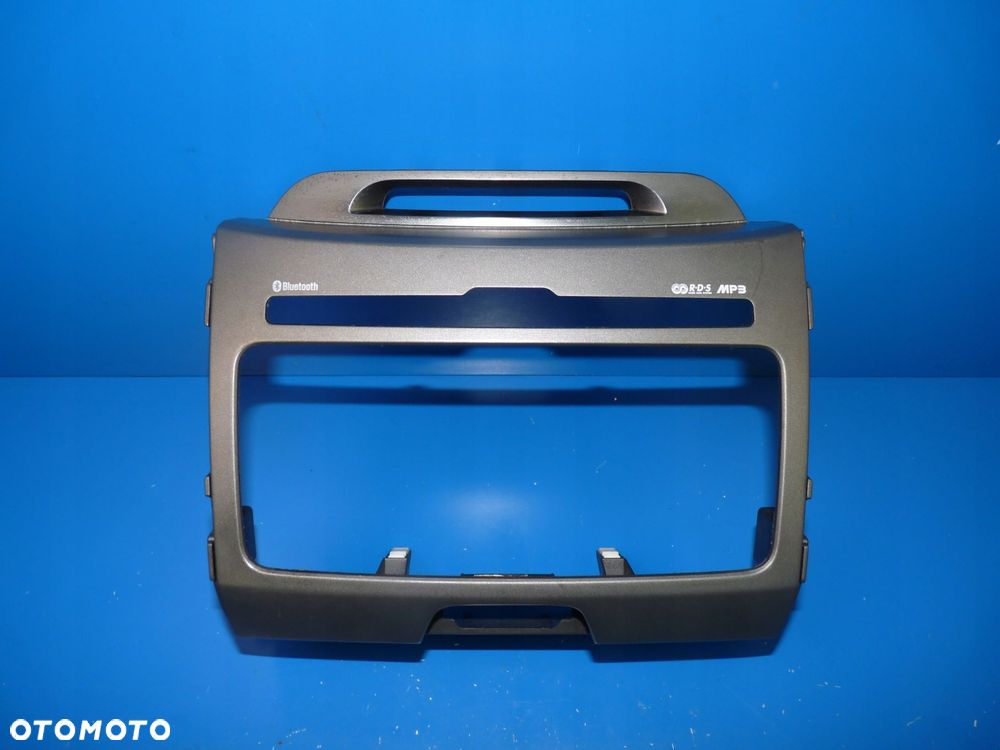 KIA SPORTAGE III RAMKA DESKI KONSOLI RADIA OSŁONA - 1