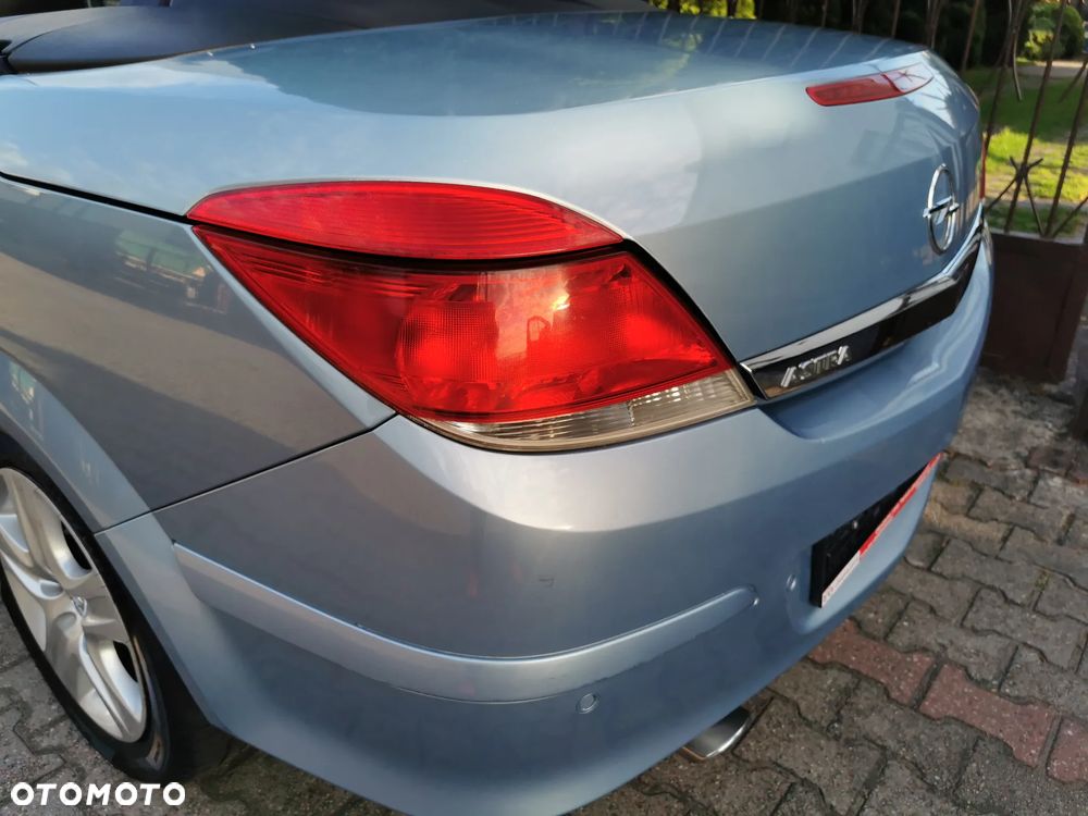 Opel Astra 1.8 Cosmo - 30