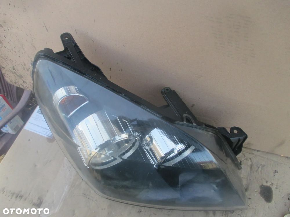 lampa prawa Opel Astra 3 H Hella Europa - 6