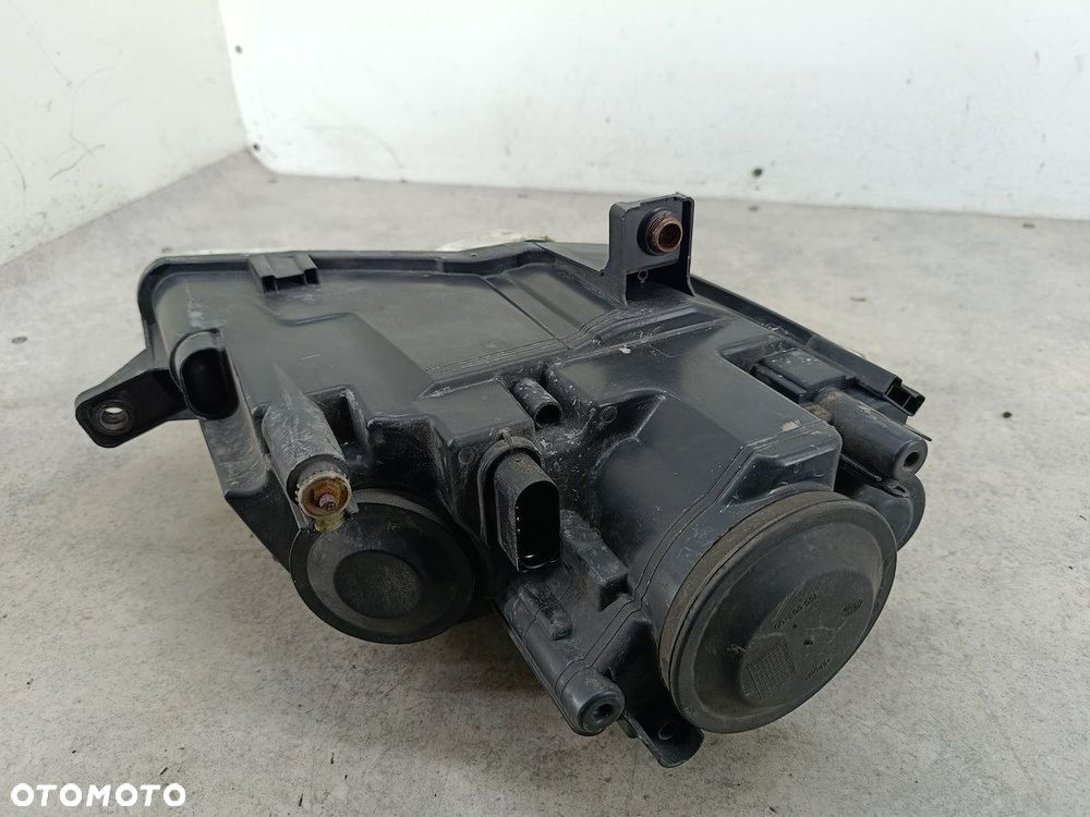 LAMPA PRZÓD LEWA VW PASSAT B6 3C0941005J 1EL247014-01  HELLA - 9