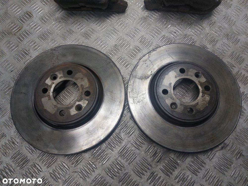 TARCZE HAMULCOWE PRZÓD + ZACISKI RENAULT MEGANE I LIFT 1.6 16V - 2