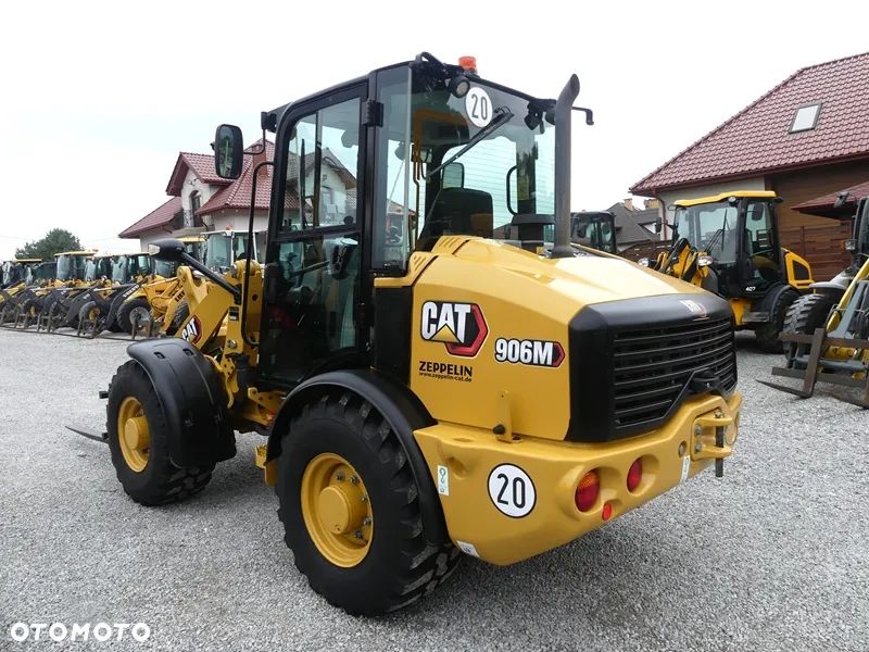 Caterpillar CAT 906M Z Niemiec / 2.527mtg Serwisowany / Idealny / - 2