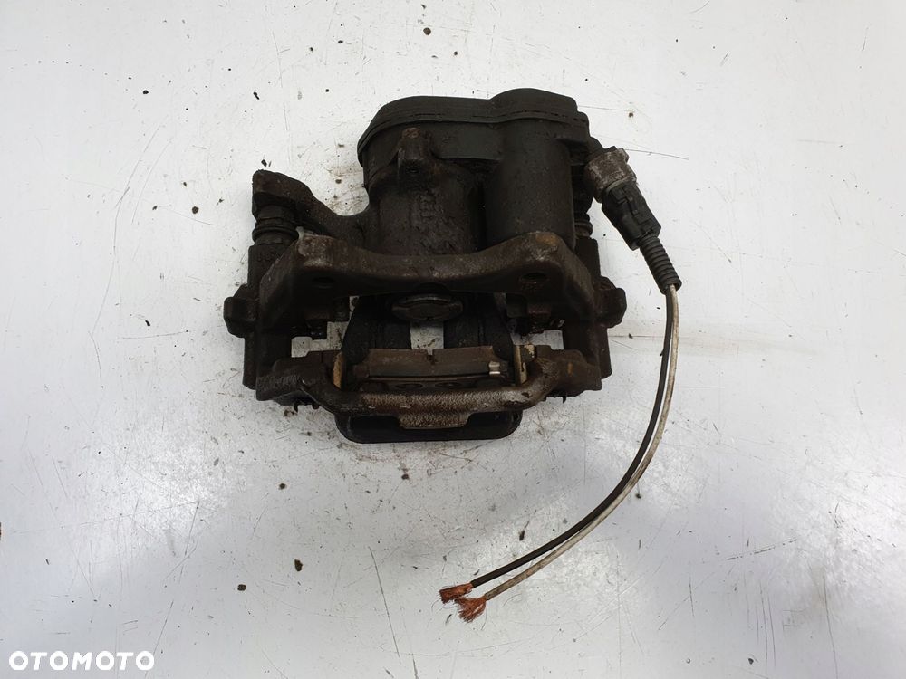 Toyota Corolla XII E21 TYLNY ZACISK HAMULCOWY lewy tył KIEROWCY - 7