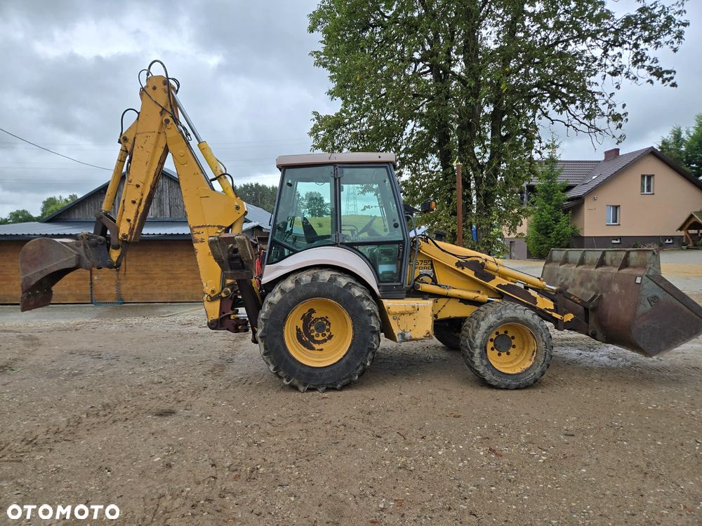 Ford New Holland 675-E Koparko ładowarka 4x4 - 4