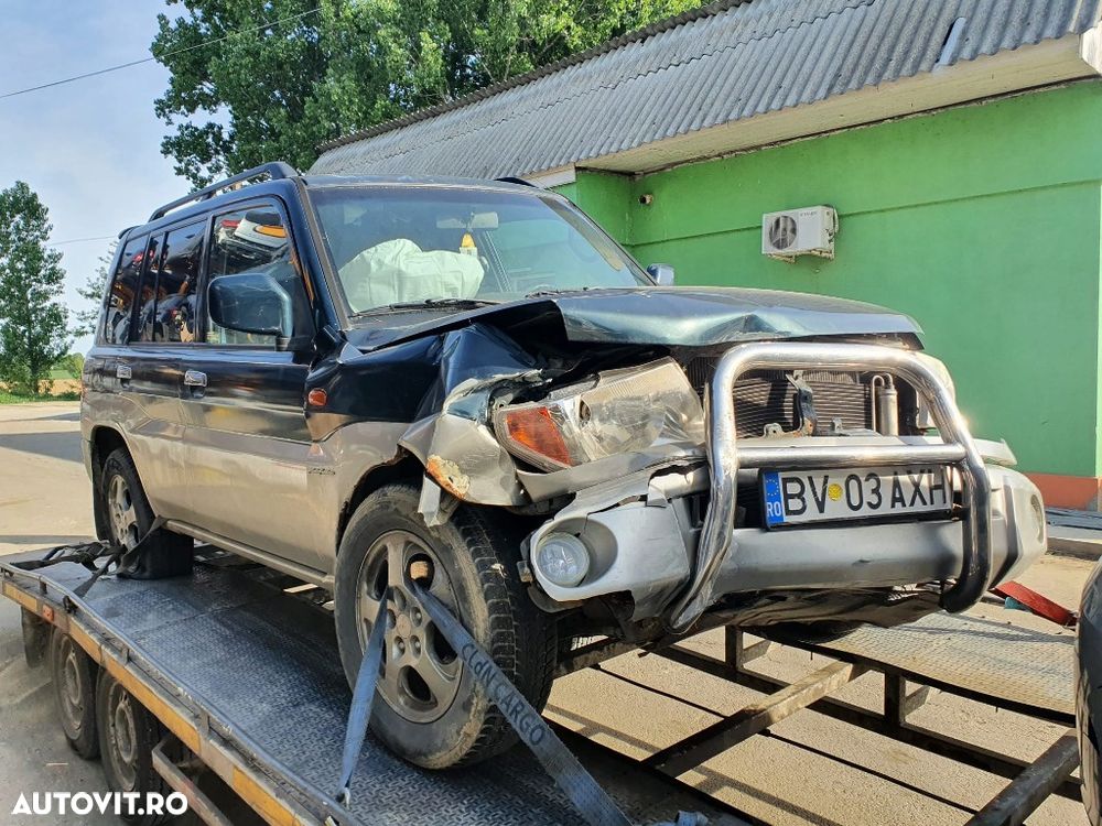 bara spate capota portbagaj haion mocheta rulou oglinda stanga dreapta Mitsubishi Pajero Pinin motor 1.8 benzina dezmembrez - 4
