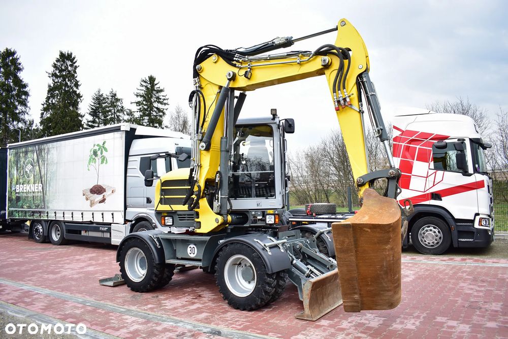 Wacker Neuson EW 100 Koparka kołowa 10.5 T/ Powertilt/ 4 Łyżki/ Podpory + Pług/ 2021/ 3.700 Mth/ Sprowadzona z Austri ! - 10