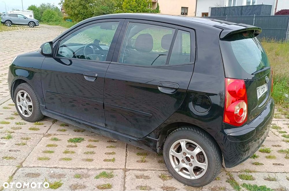 Kia Picanto 1.1 Optimum + - 7