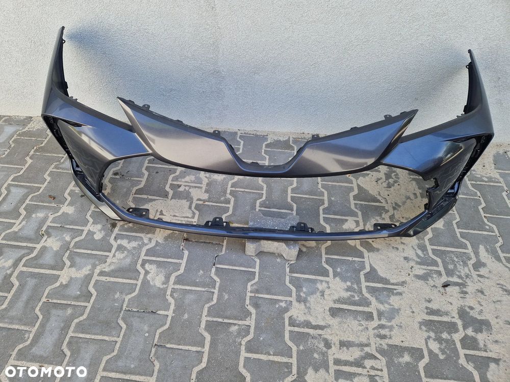 Zderzak Toyota Corolla XII E210 E21 sedan  bez dziur - 2