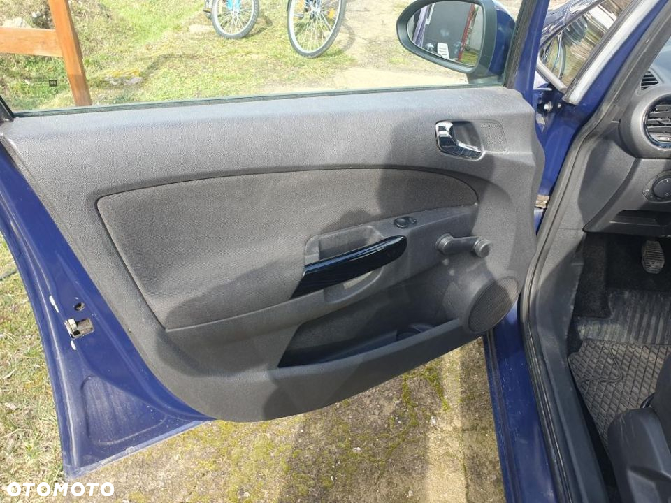 Opel Corsa 1.2 16V Enjoy - 11