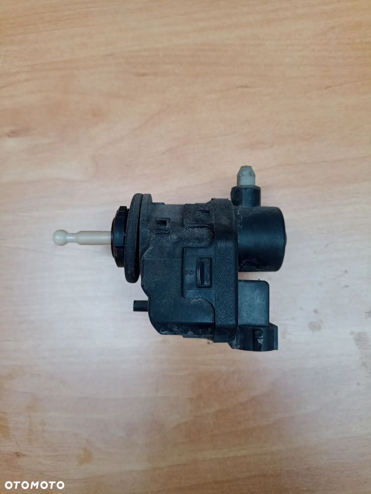 Renault silniczek regulacji lampy 7700420736