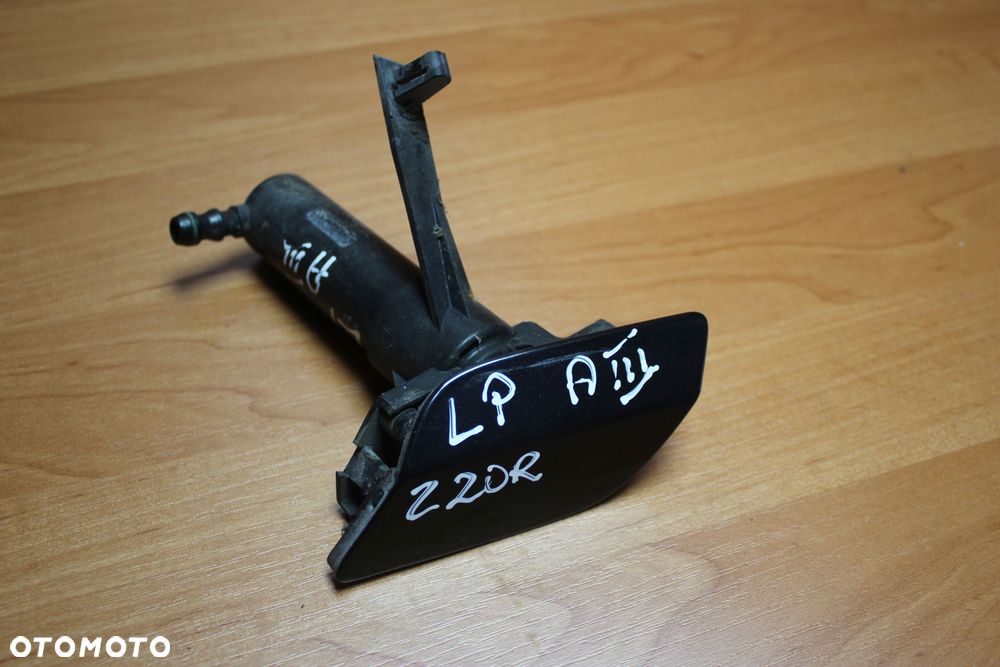 SPRYSKIWACZ LAMPY LEWY PRZÓD OPEL ASTRA H Z20R - 1