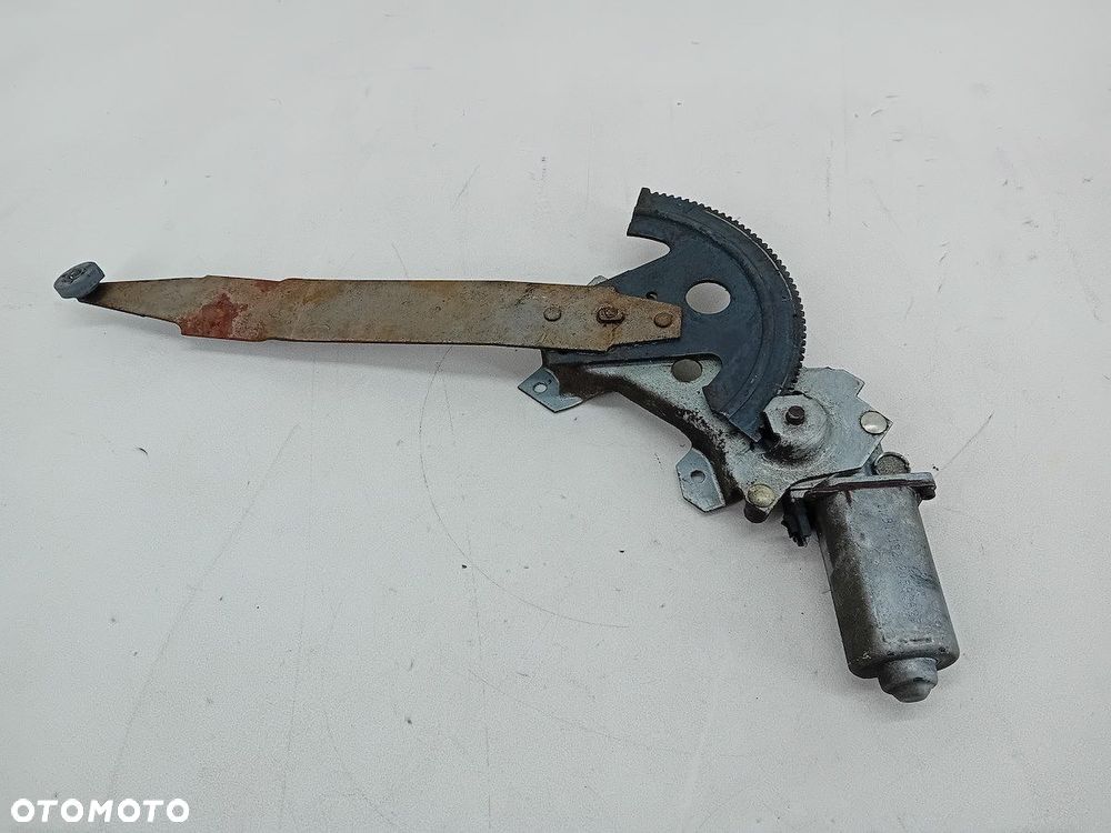 PODNOŚNIK SZYBY LEWY PRZÓD CHEVROLET BERETTA (87-96) - 1