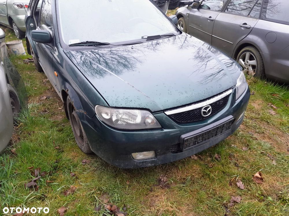 Mazda 323 323f 323  BJ 98-03  Maska lampa zderzak atrapa w kolor 18J - 12