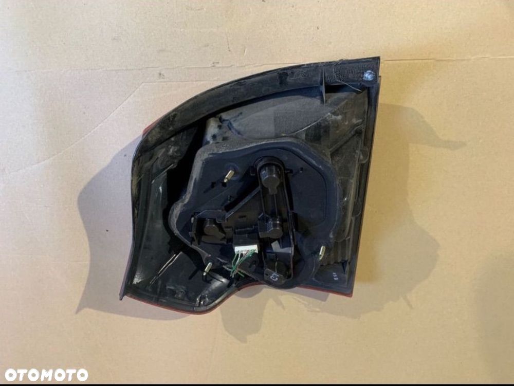 Lampa tył tylna lewa 3d HB Toyota corolla e12 - 2