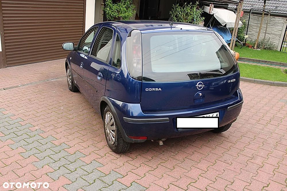 Opel Corsa 1.2 16V Cosmo - 6