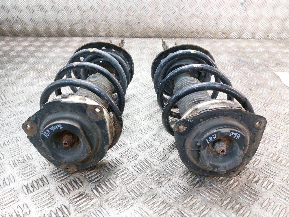 AMORTYZATOR LEWY + PRAWY PRZÓD X-TRAIL II T31 2.0 DCI - 4