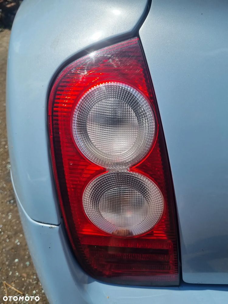 NISSAN MICRA III K12 03-07 2005 r. 5D HB lampa lewy tył lewa tylna LT EU * - 1