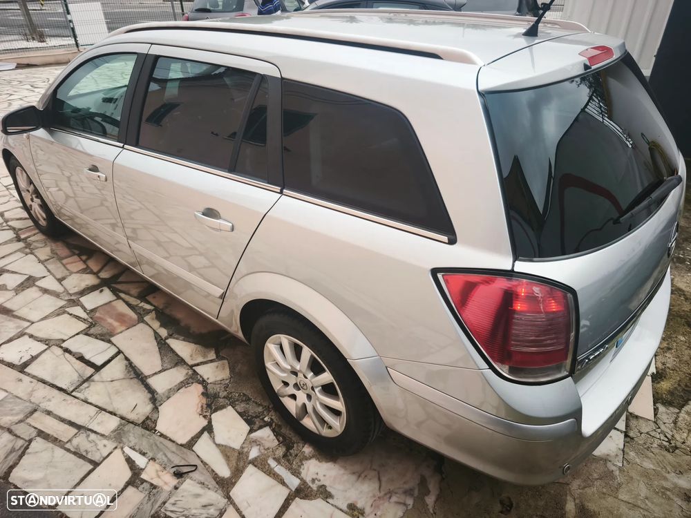 Opel Astra Caravan 1.9 CDTi Cosmo - 26