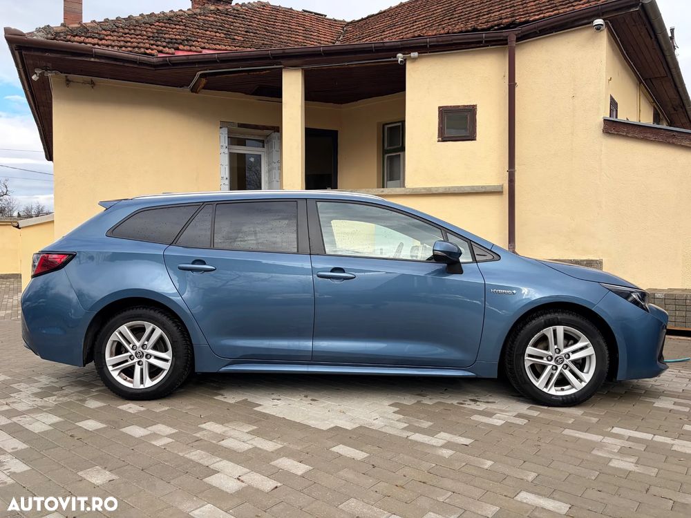 Toyota Corolla 1.8 HSD Business - 33