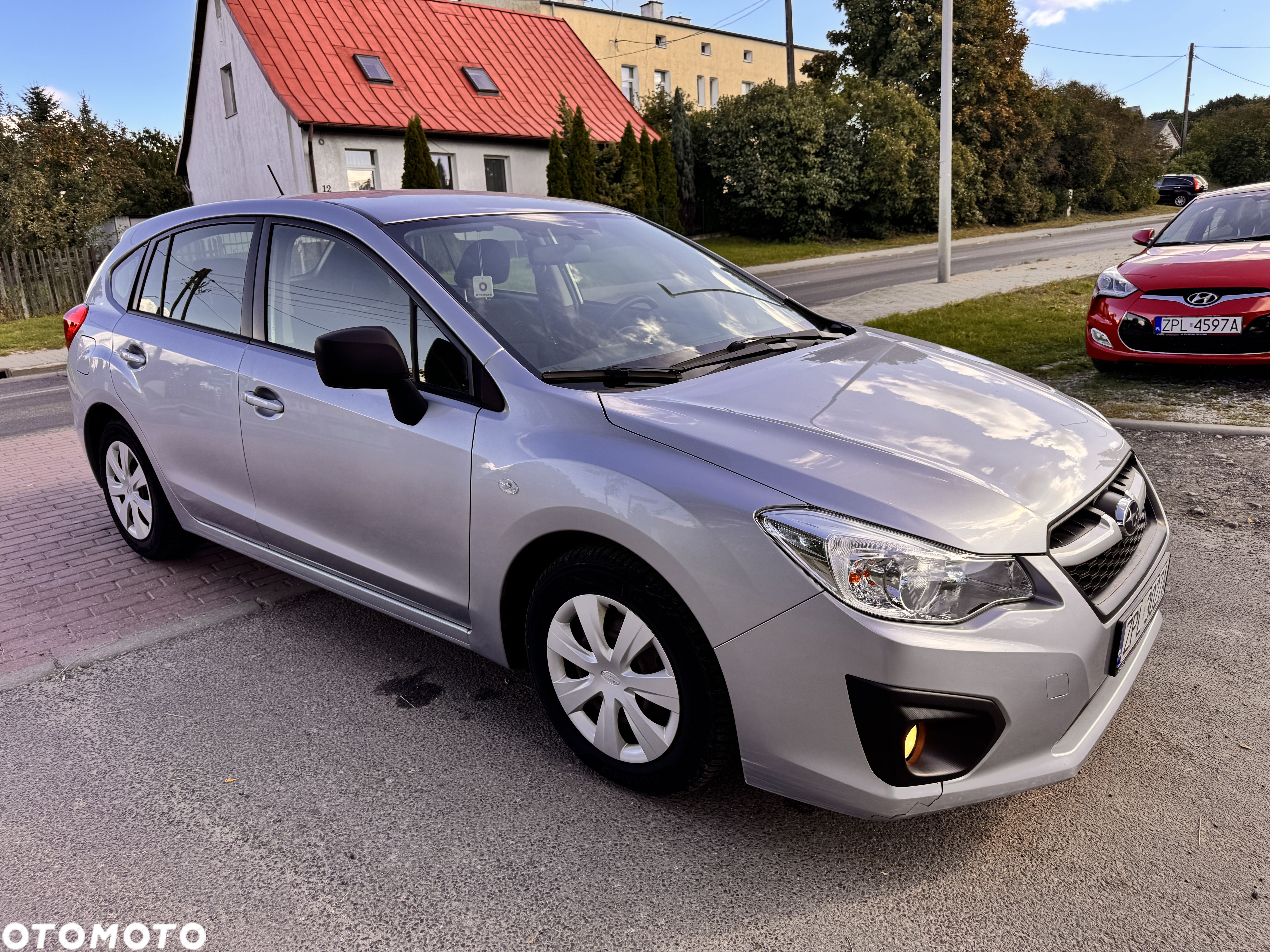 Subaru Impreza 1.6i Comfort - 1