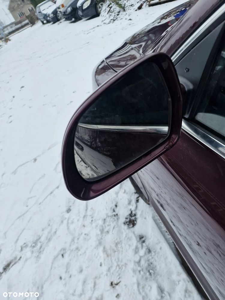 Lusterko  lewe  skoda  superb II  elektrycznie  składane 13 pinów  w kolorze  X7X7 - 2