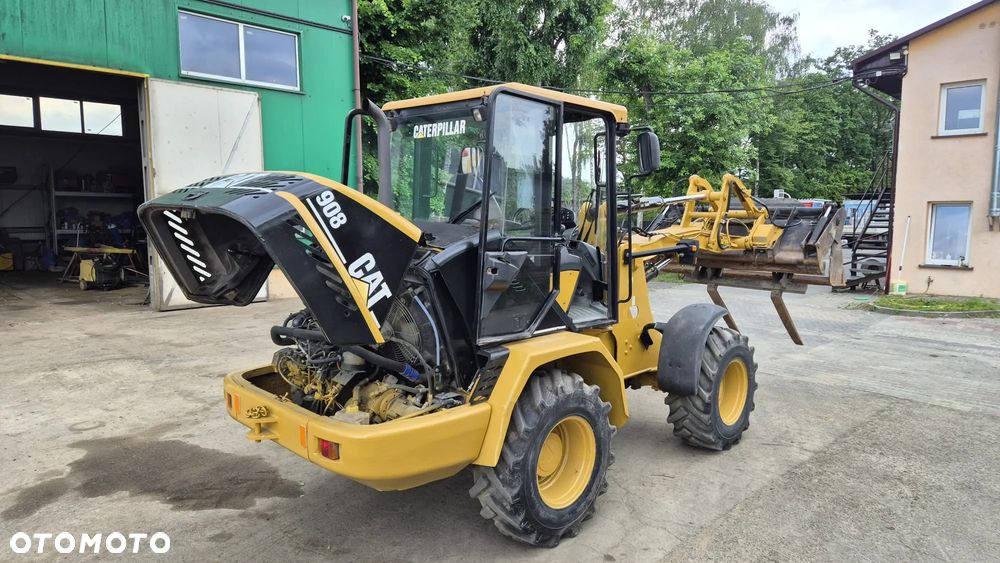 Caterpillar 908 - 5