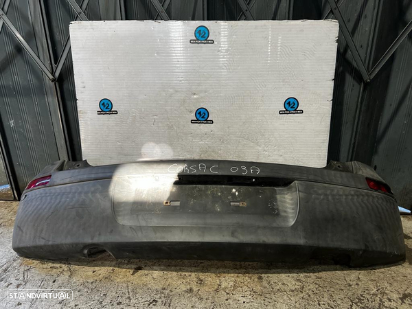 Parachoques traseiro Opel Corsa C ano 2003