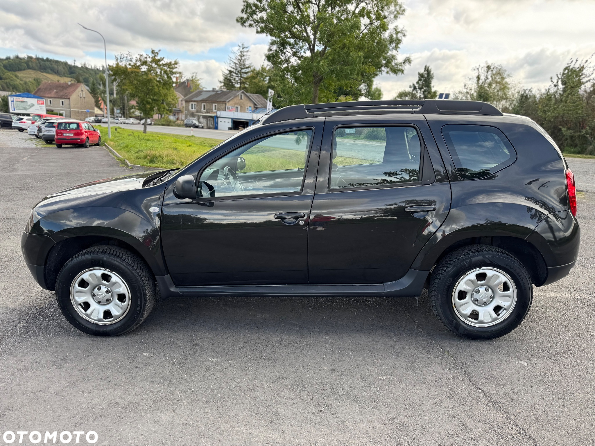 Dacia Duster 1.6 16V 4x2 Laureate - 18