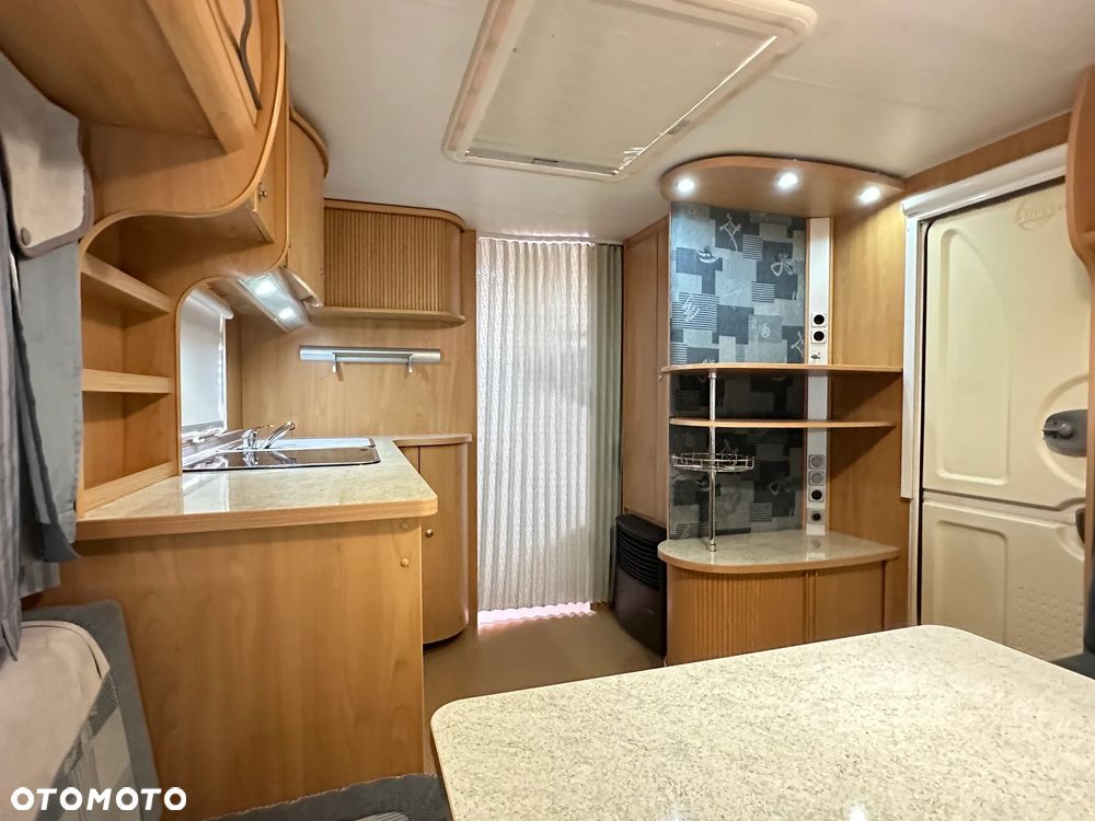 Burstner 720 TK VENTANA z napędem i łóżkami piętrowymi - 8 os. - 11