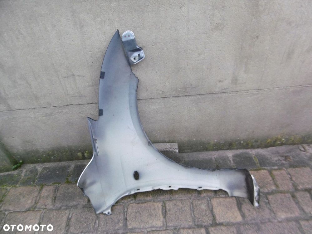 SUZUKI SWIFT MK7 - błotnik przedni lewy - 3